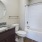 a bathroom with a tub toilet and sink
